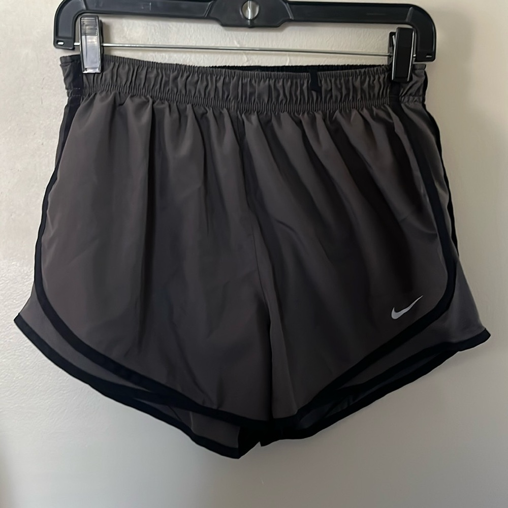 dark grey Nike running shorts